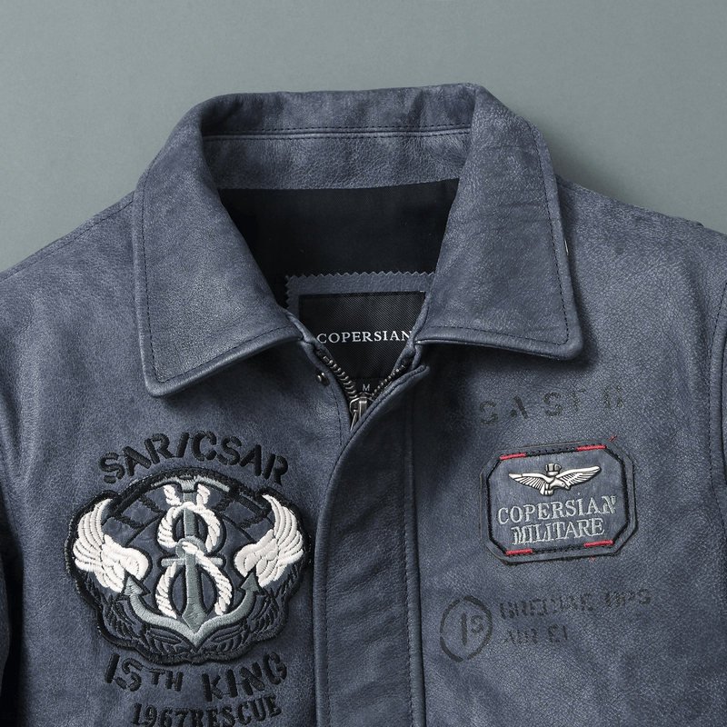 Men's motorcycle jacket featuring embroidery, big pockets, and a stylish collar in genuine leather.