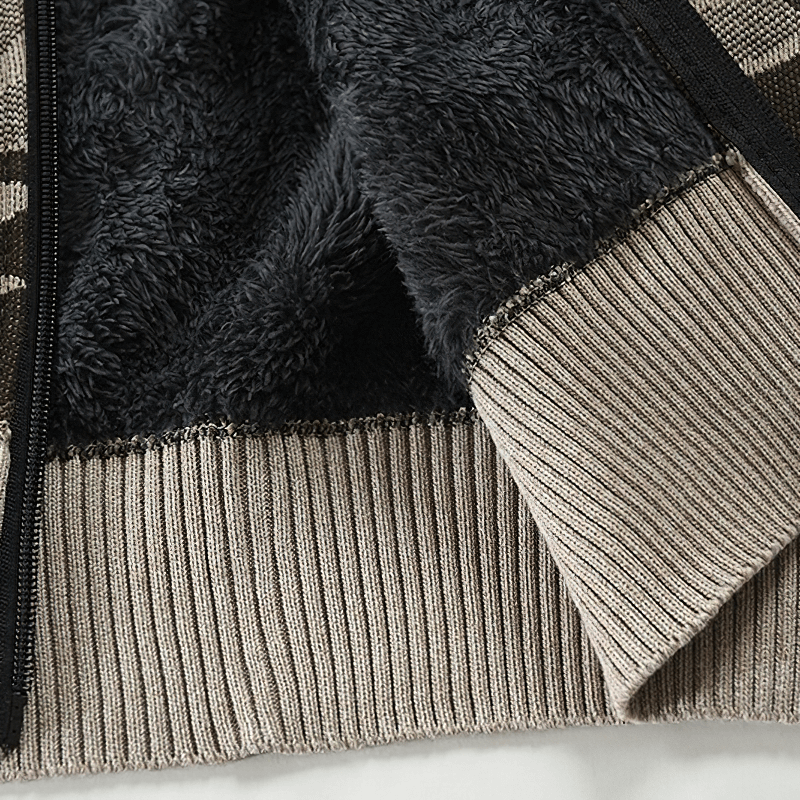 Close-up of the men's fleece hooded cardigan showcasing its camouflage pattern and cozy ribbed cuffs.