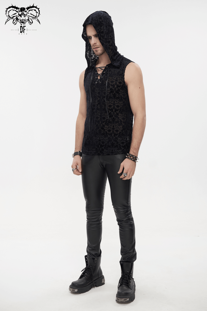 Men's floral printed gothic tank top with hood, stylish black attire paired with sleek leather pants.