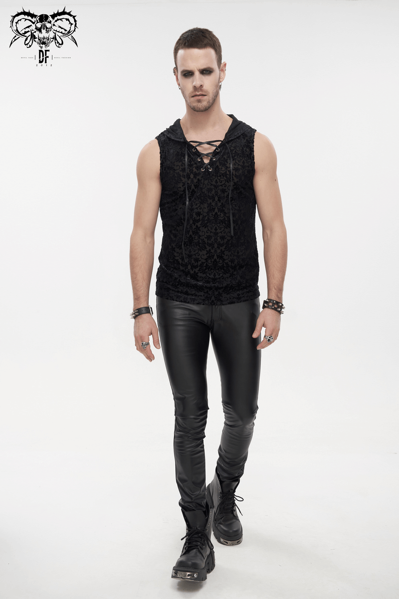 Men's black floral printed tank top with hood and lace-up front, paired with shiny black pants.