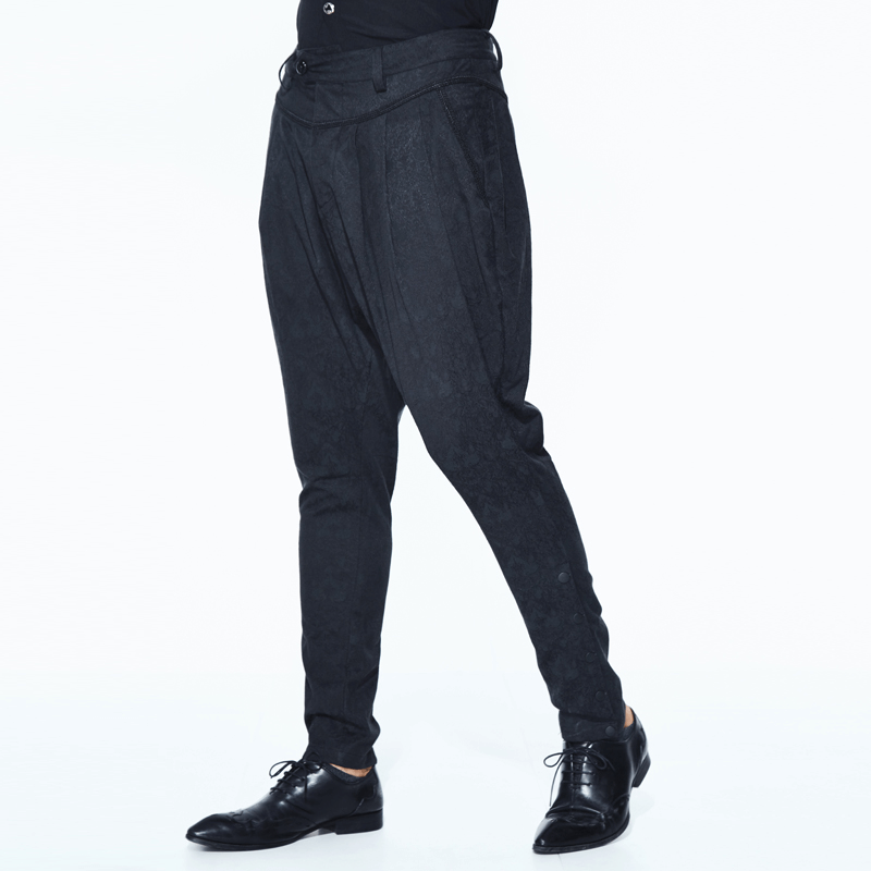 Men's black baggy trousers with delicate gothic pattern, perfect for a stylish gothic wardrobe.