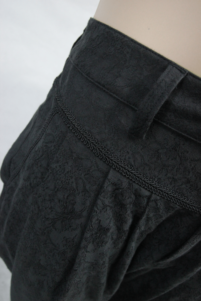 Men's Gothic black baggy trousers with delicate pattern detail, perfect for a stylish gothic outfit.
