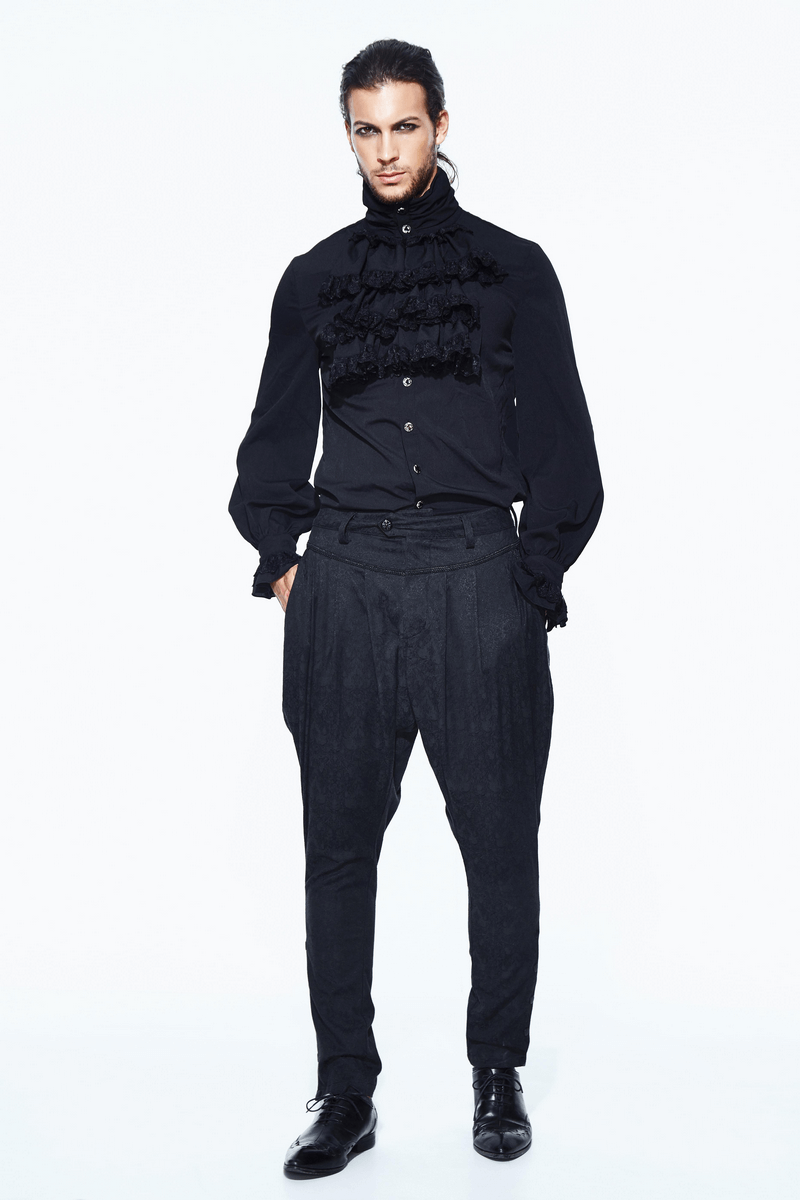 Fashionable male model in gothic-style black shirt and baggy trousers, showcasing a unique elegant outfit.