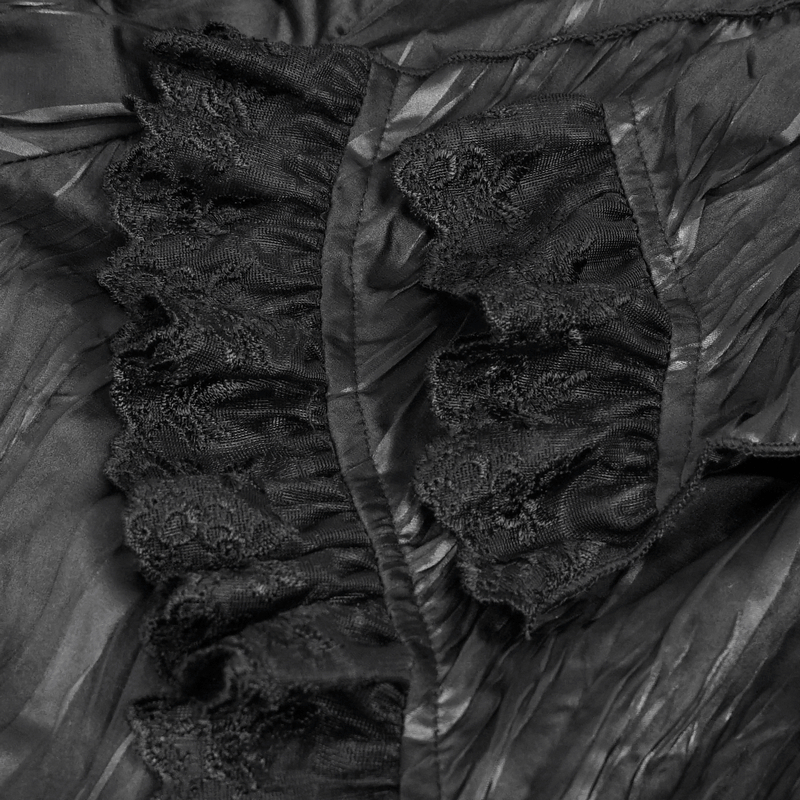 Close-up of black gothic ruffled fabric with intricate lace detailing, showcasing a stylish puff-sleeved shirt design.