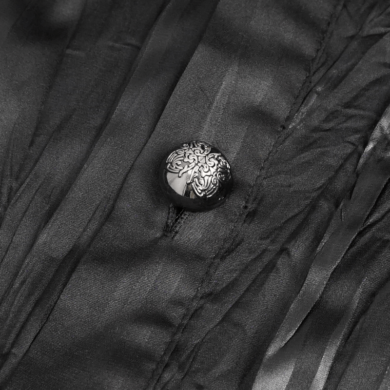 Close-up of intricate button detail on men's gothic puff-sleeved ruffled black shirt, showcasing unique design.
