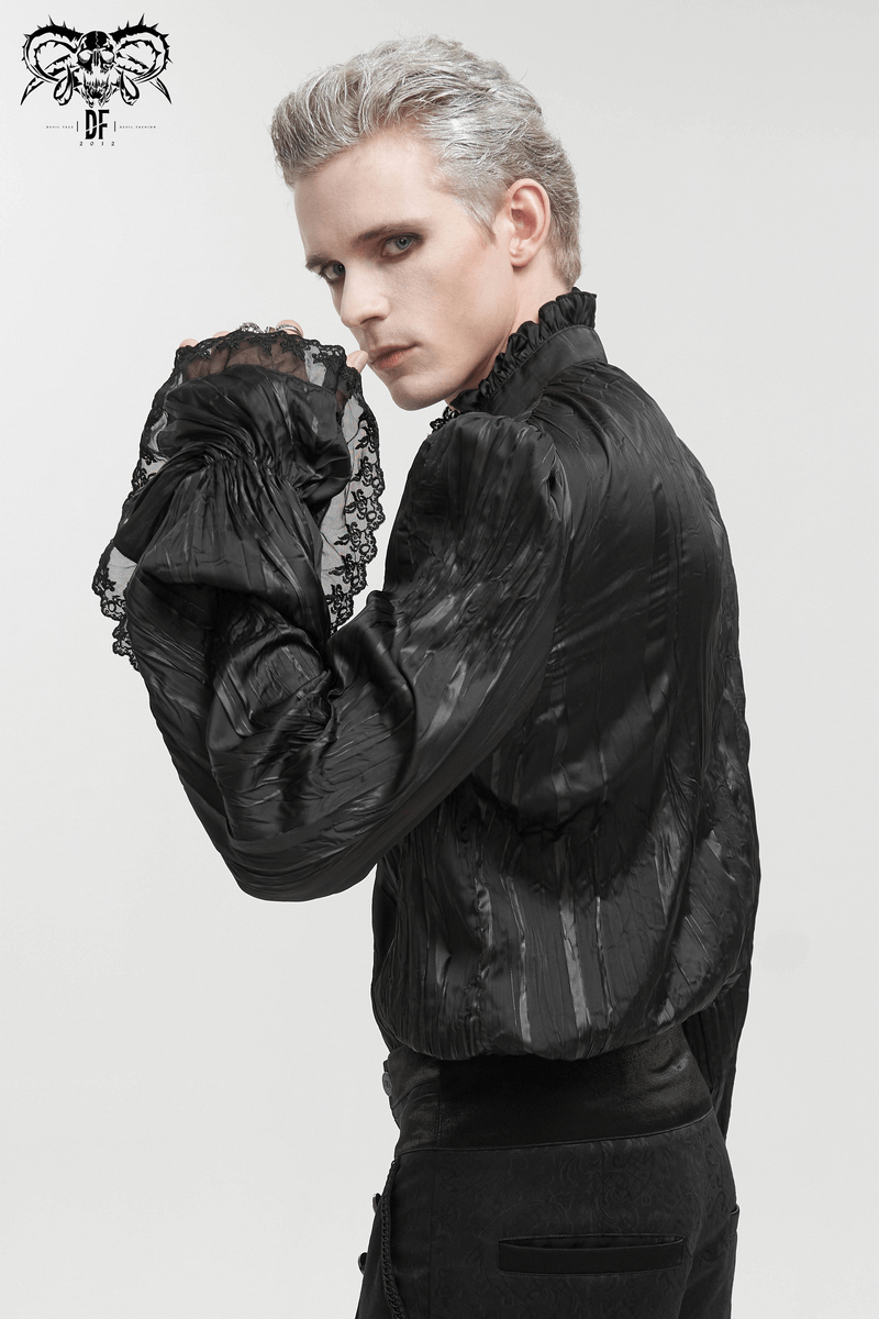 Model showcasing men's gothic puff-sleeved ruffled black shirt with intricate lace and removable chains.