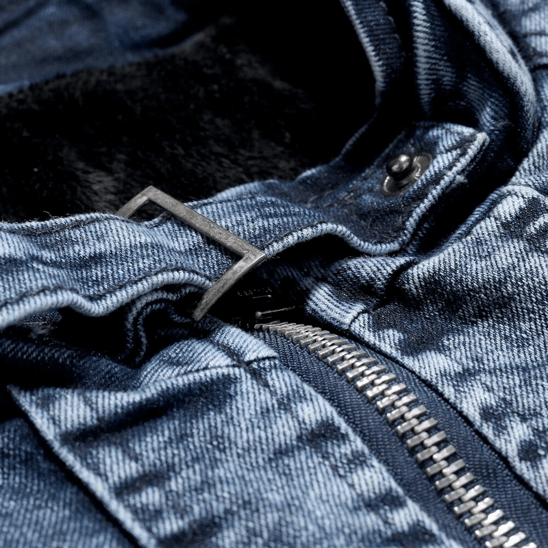 Close-up of the zipper and plush lining in a men's denim biker jacket, showcasing quality craftsmanship.