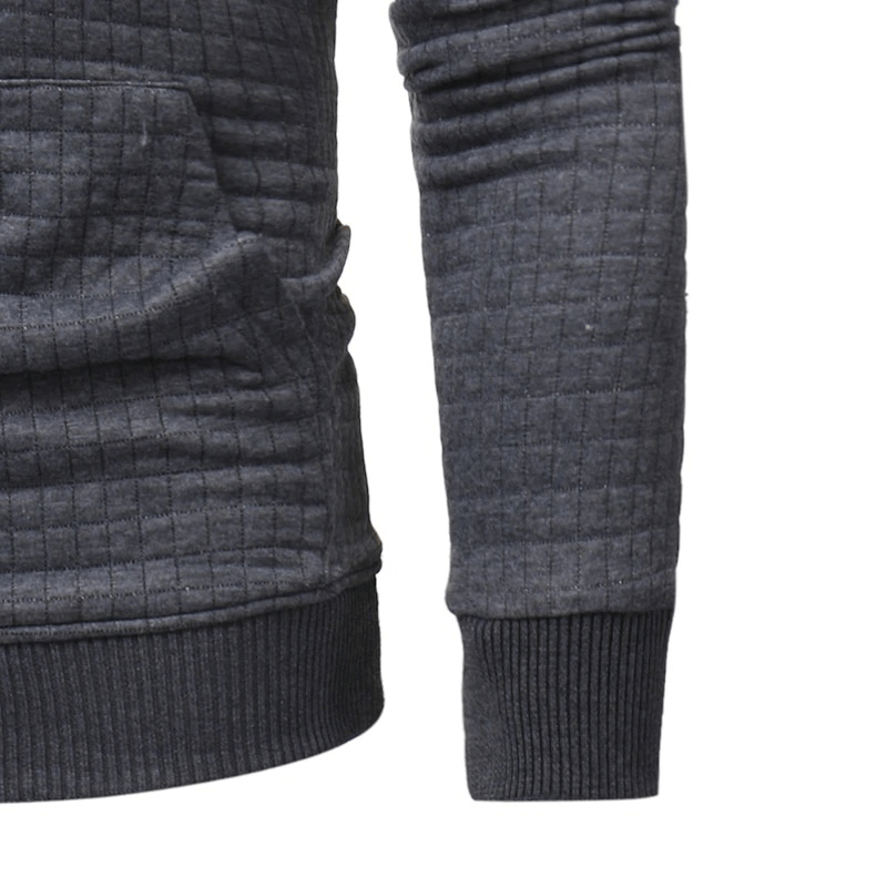 Close-up of a men's long sleeve hoodie in a stylish quilted texture, showcasing modern casual wear.