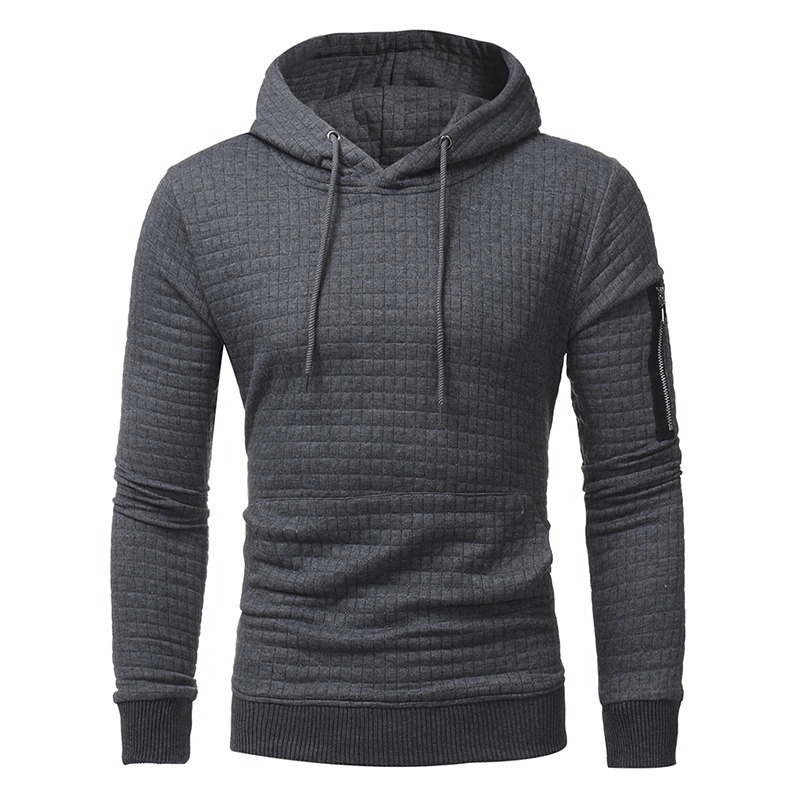 Men's long sleeve hoodie in dark gray with a modern quilted design and stylish zip pocket.