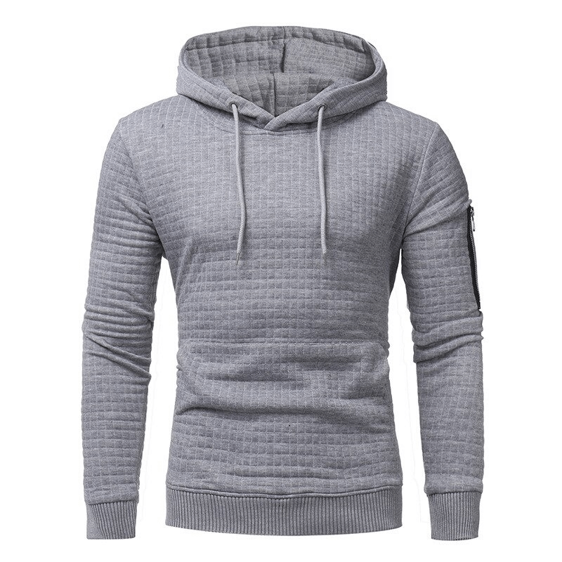 Men's gray long sleeve hoodie with modern quilted design and front pocket for casual outfits.