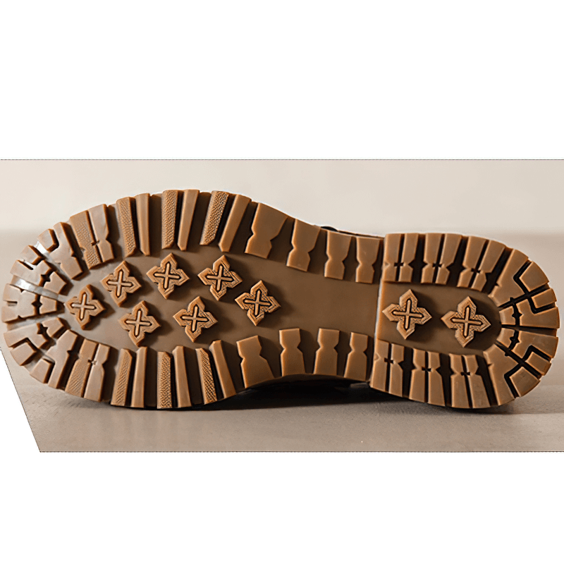 Rubber sole of men's punk rock shoes showcasing non-slip traction design for comfort and stability.