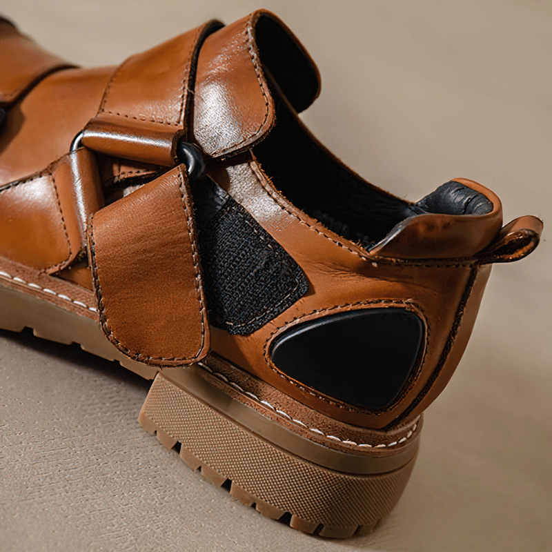 Stylish men's genuine leather punk rock shoes with rubber platform and unique design details.