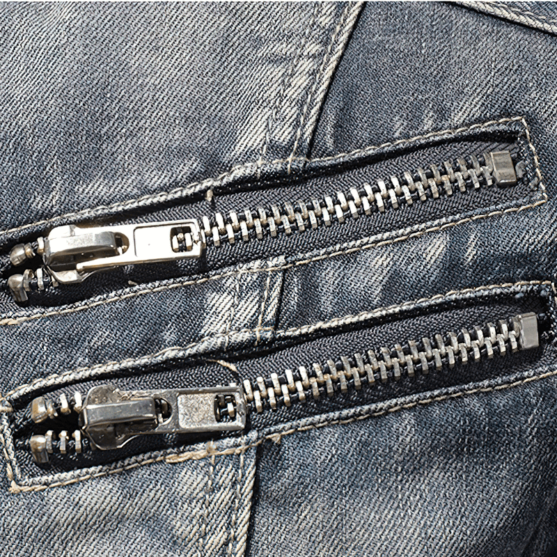 Close-up of zippers on a men's denim motorcycle jacket showcasing quality craftsmanship and trendy design.