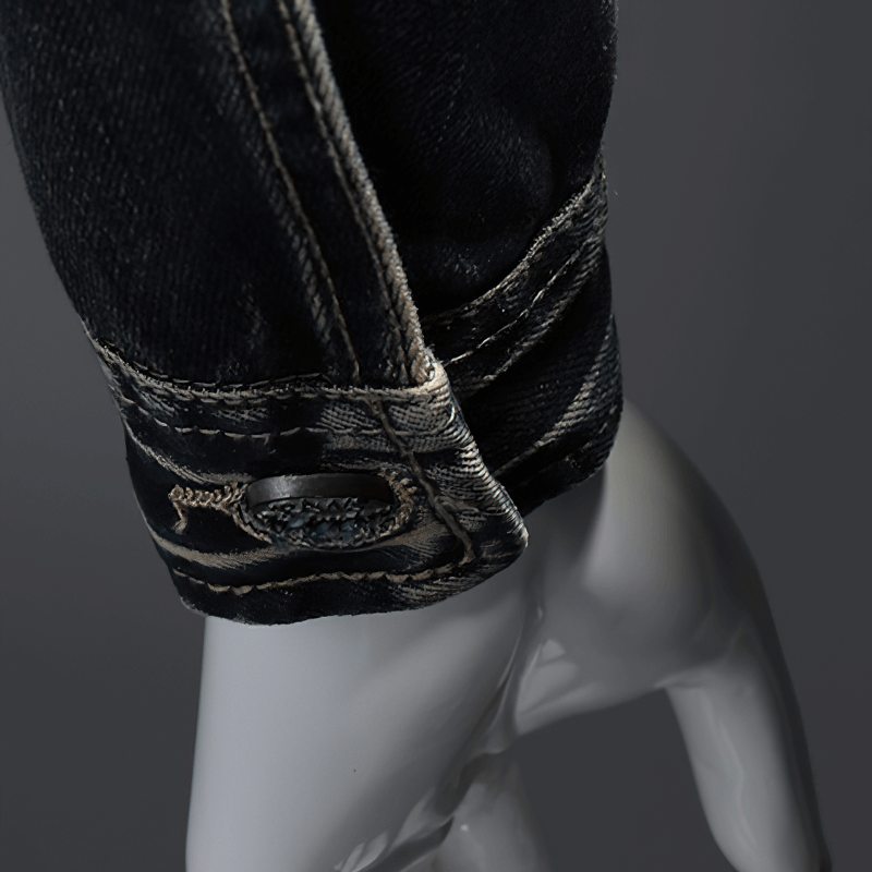 Close-up of the cuff detailing on a men's motorcycle zipper denim jacket, showcasing stylish stitching and quality fabric.
