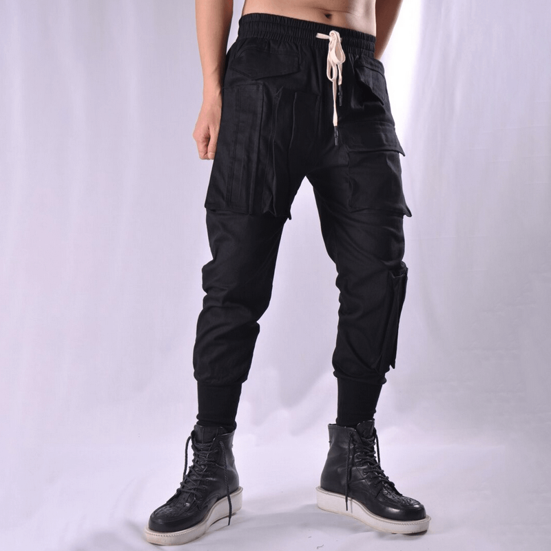 Men's black cargo joggers with multi-pocket design and stylish cut, perfect for a trendy alternative look.