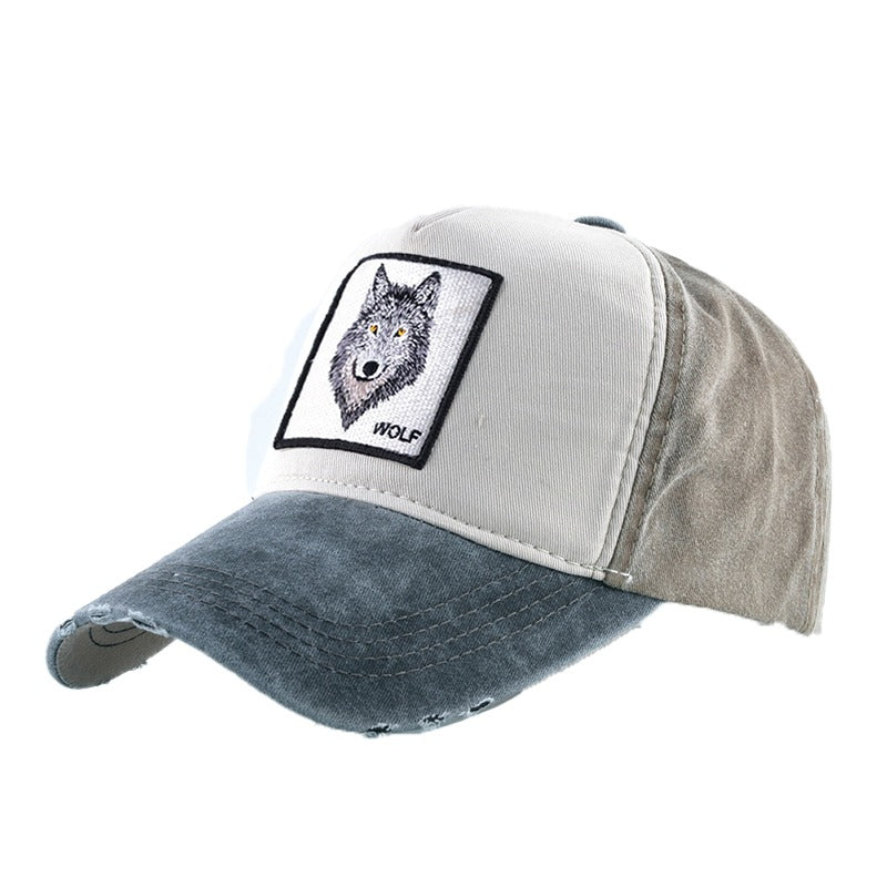 Men & women unisex baseball cap with wolf embroidery in stylish washed denim, perfect for festivals and nature outings.