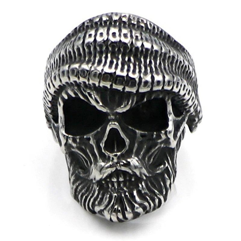 Men's bearded skull ring wearing a beanie, stylish alternative jewelry for a cool concert vibe.