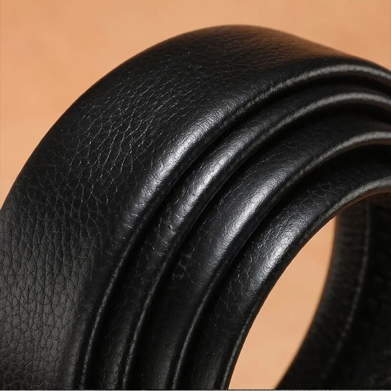 Close-up of a black vintage genuine leather men's belt showcasing its elegant texture and design.