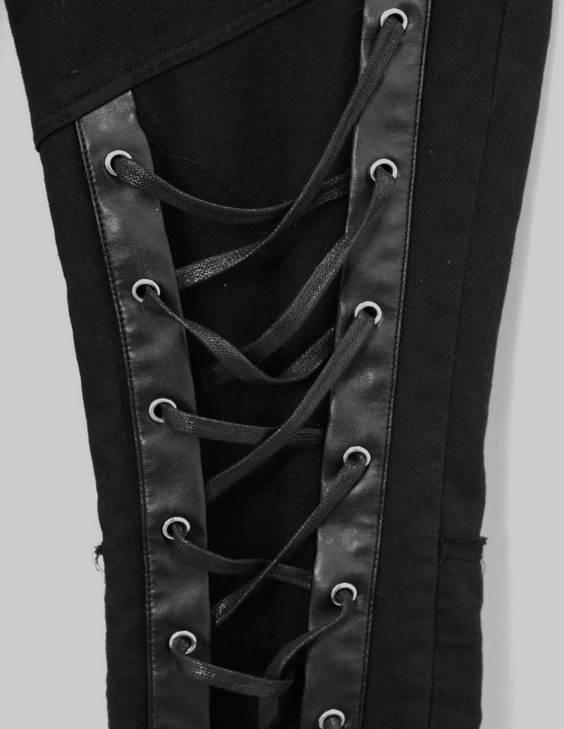 Close-up of men's black punk style pants featuring unique lacing detail for a gothic fashion statement.