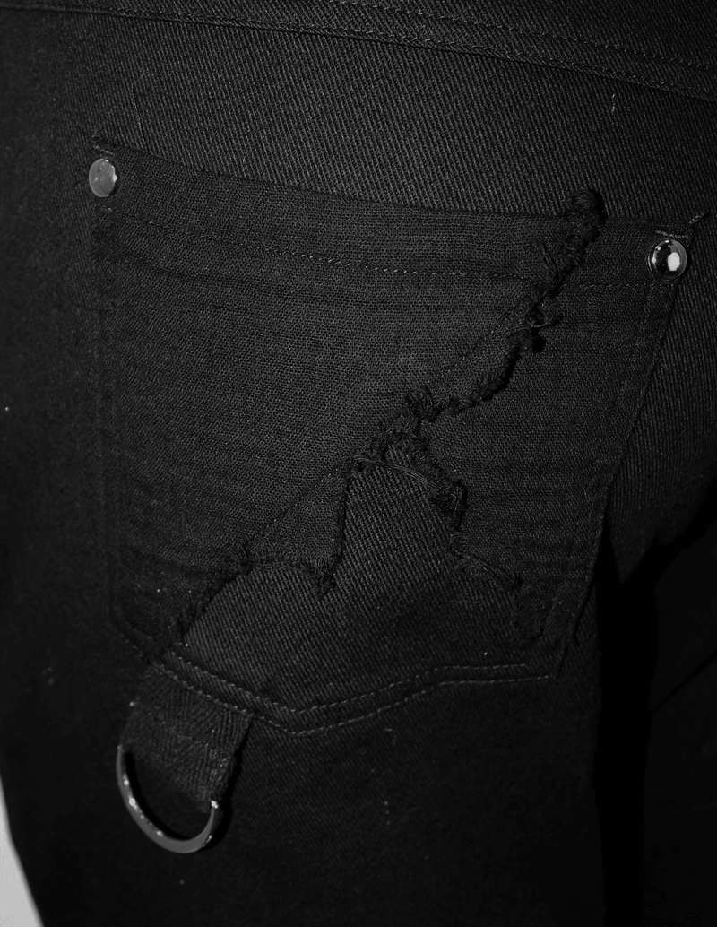 Close-up of men's black punk pants featuring distressed pocket and lacing detail, perfect for a gothic style.