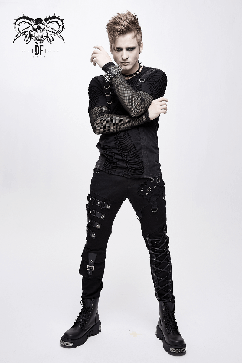 Punk style men's black pants with lacing, rivets, and unique studs, paired with a stylish black shirt.