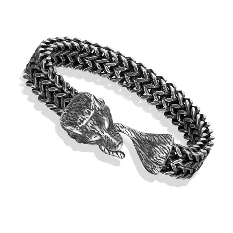 Men's vintage stainless steel wolf head bracelet on a white background featuring a unique chain design.