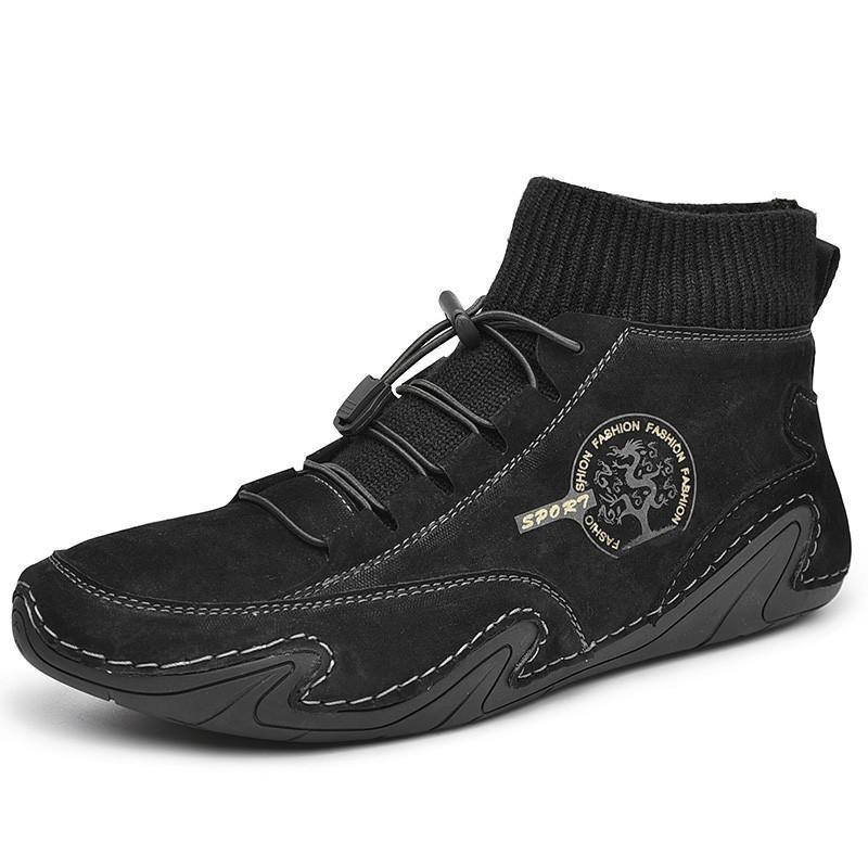 Stylish black suede high-top sneakers with elastic ankle support and decorative logo detail.