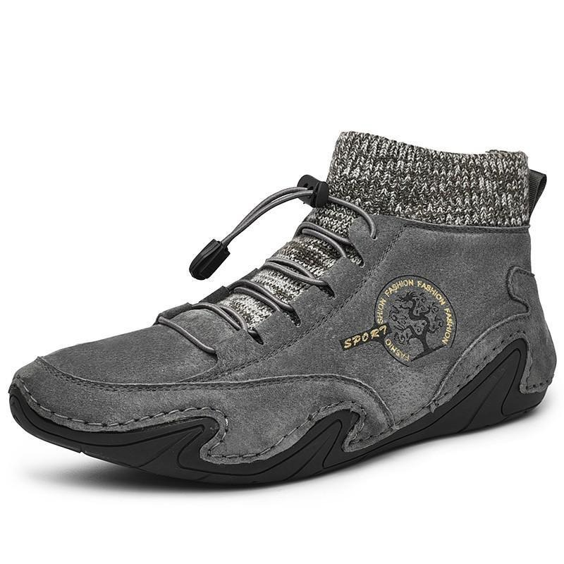 Men's casual gray sneakers with knit ankle and stylish lacing, perfect for comfort and trendy daily wear.