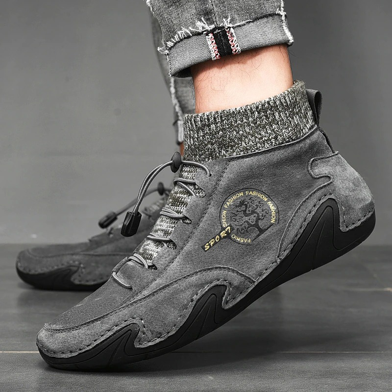 Men's casual sneakers in gray suede with ankle support for style and comfort, perfect for daily wear.