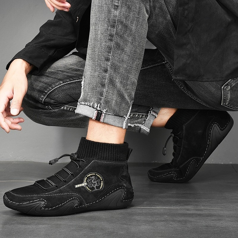 Men's casual sneakers in black suede with elastic ankle, stylish design, perfect for comfortable daily wear.