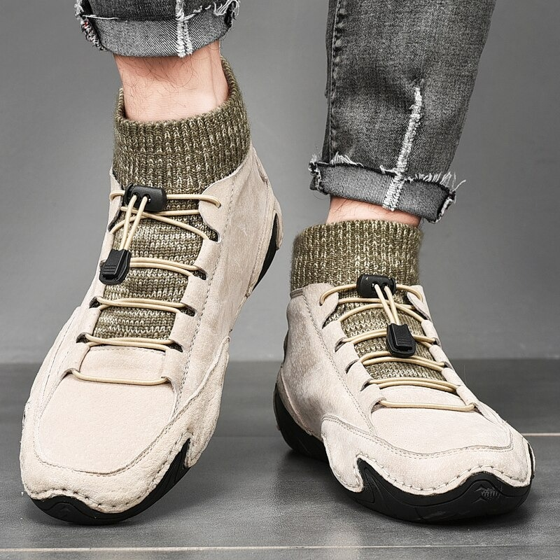 Men's casual sneakers in beige suede with breathable knit upper, perfect for stylish comfort and daily wear.