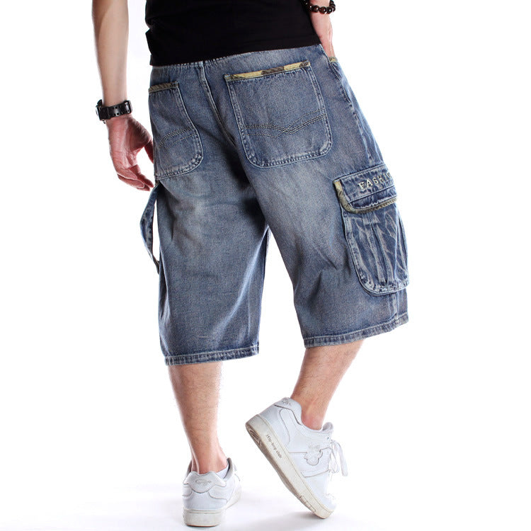 Men's baggy denim shorts with pockets, perfect for streetwear vibes and comfort in casual looks.