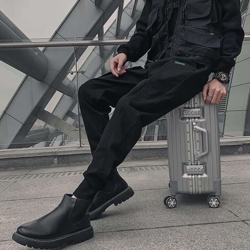 Stylish men's drawstring black cotton pants featuring a modern cut, perfect for casual outings and travel.