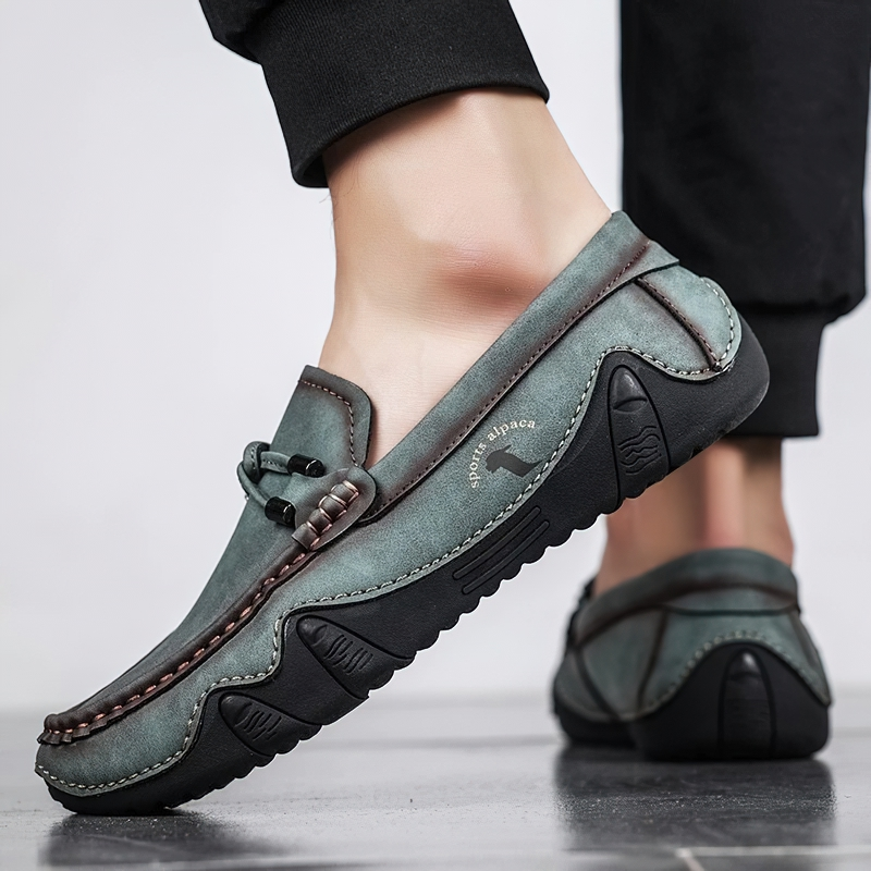 Stylish men's handmade loafers in PU leather, perfect for casual outfits and comfort on the go.