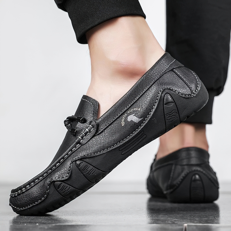 Stylish men's handmade moccasins made of black PU leather, perfect for casual wear and comfortable fit.