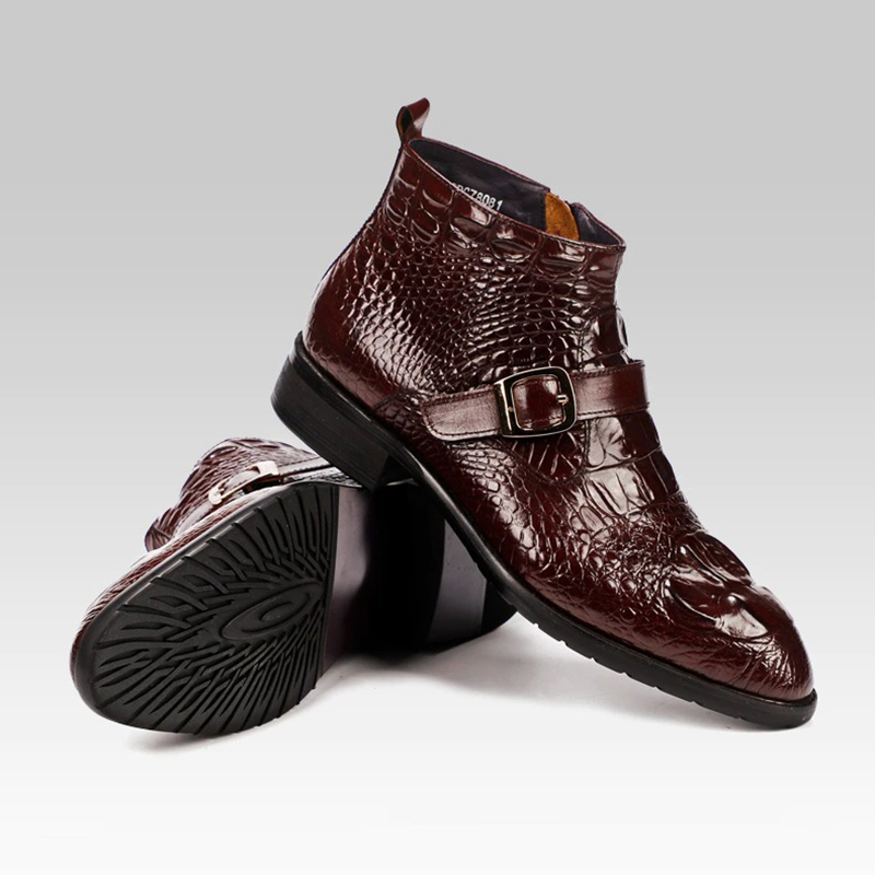Stylish men's genuine leather pointed toe zip boots featuring a buckle, in a luxurious burgundy crocodile pattern.