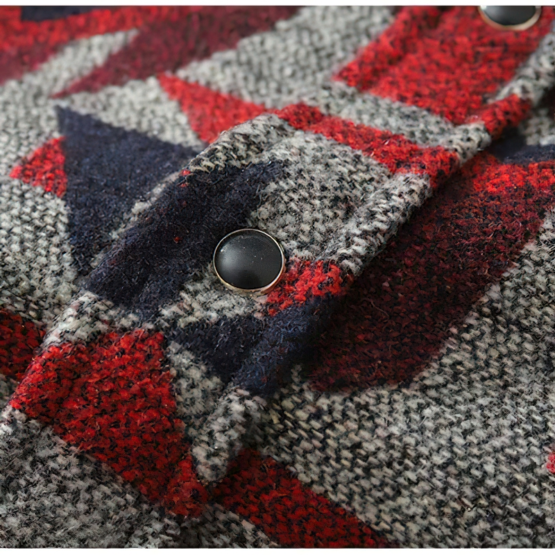 Close-up of men's geometric pattern shirt in red and gray fabric with buttons, showcasing its stylish design.