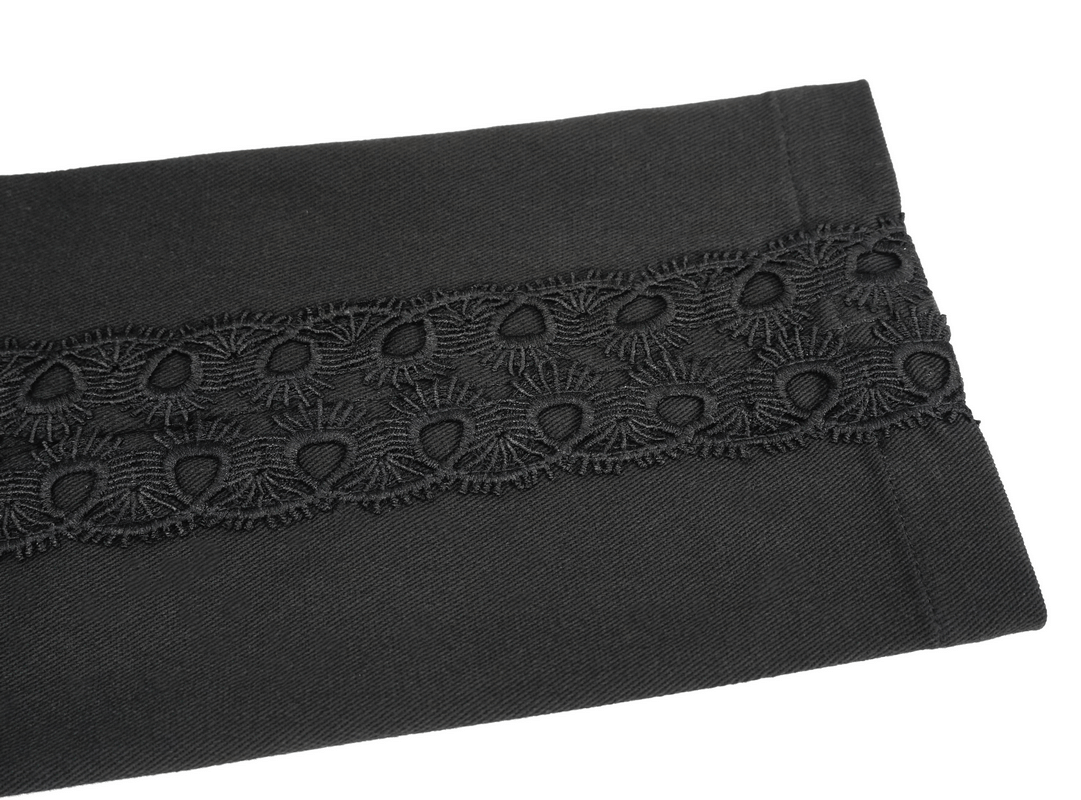 Close-up of black Gothic jacquard fabric with intricate lace detail for men's pants.