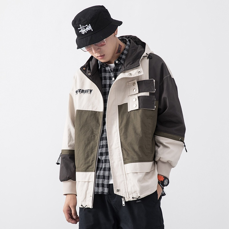 Men's loose-fit streetwear jacket with multi pockets, styled in cotton for a casual hip hop look.