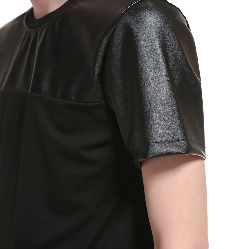 Men's leather patchwork t-shirt showing sleek black fabric and stylish short sleeves, perfect for casual summer wear.