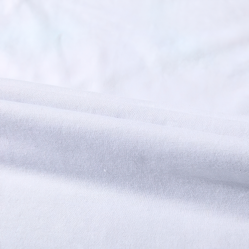 Close-up of soft, smooth fabric texture in white, ideal for summer casual wear and a stylish men's T-shirt.