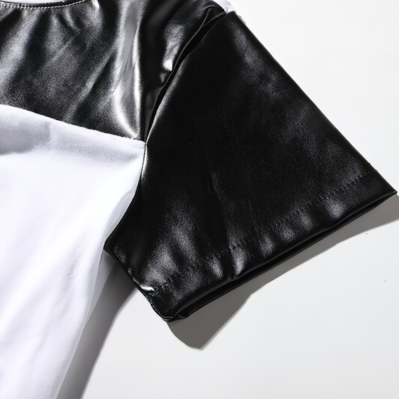 Close-up of men's patchwork leather t-shirt sleeve in black and white for casual summer style.