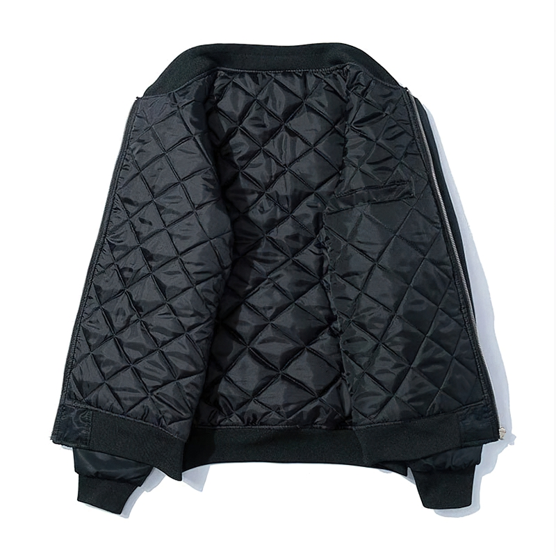 Men's black oversized jacket interior with quilted lining, perfect for casual streetwear fashion.