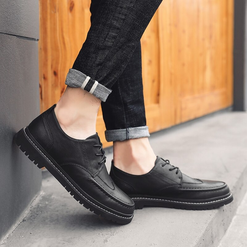 Men's black leather dress shoes with lace-up design, stylish and comfortable non-slip flats in casual style.