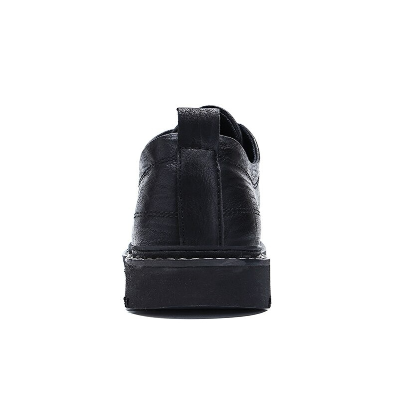 Elegant black men's leather dress shoes with lace-up design and a comfortable flat sole, viewed from the back.