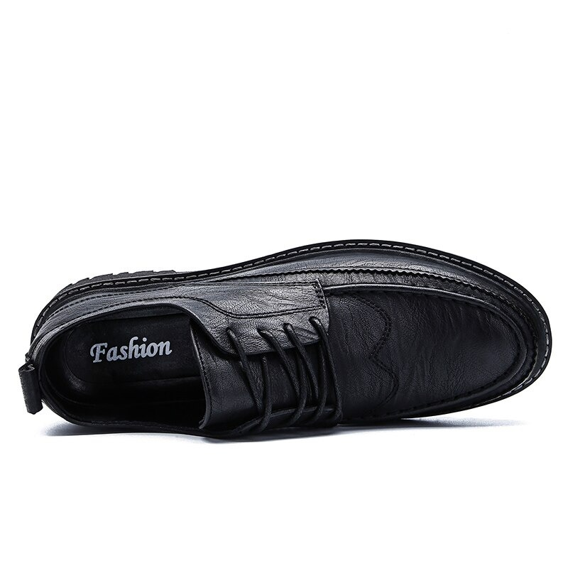 Men's black leather lace-up dress shoes with flat sole, stylish and comfortable for casual wear.