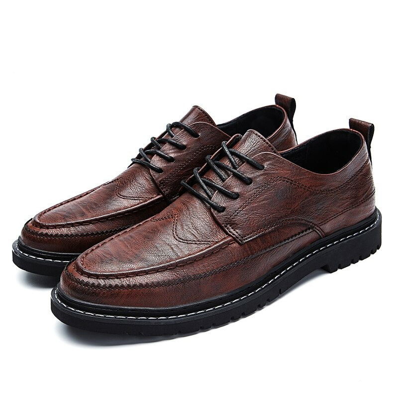 Men's brown leather dress shoes with lace-up design and non-slip flat sole in elegant British style.
