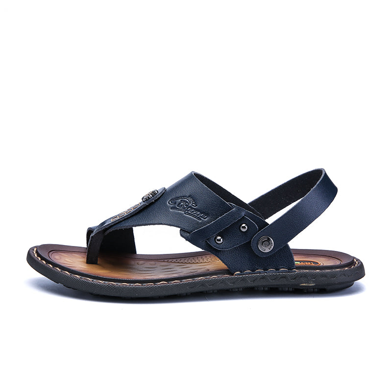 Men's leather sandals in navy with comfortable sole, perfect for casual summer outings and alternative fashion.
