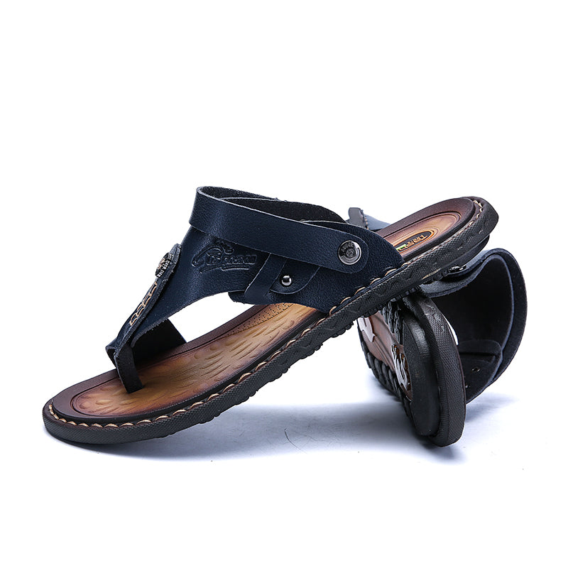Men's leather sandals in navy, perfect for summer casual wear and leisure outings, offering comfort and style.
