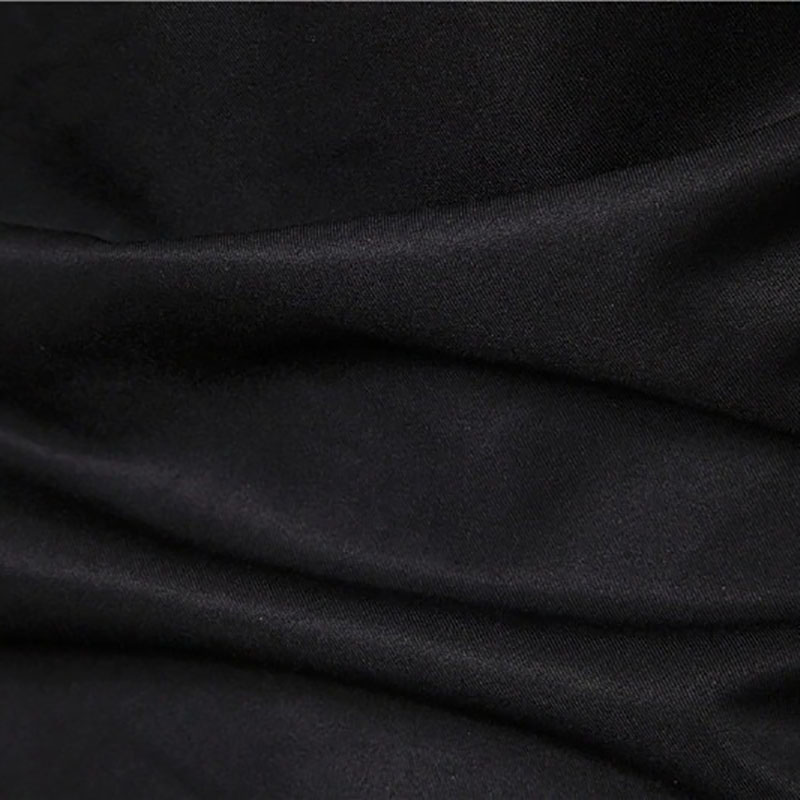 Close-up of smooth black fabric, showcasing the quality and texture for a gothic style men's long shirt.